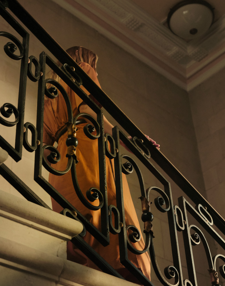 woman walking down the stairs