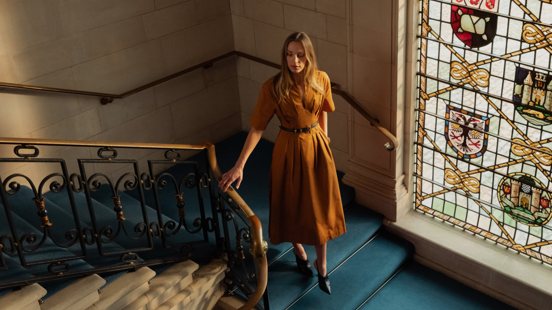 woman walking down the stairs